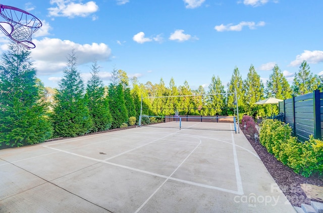 view of sport court featuring tennis court