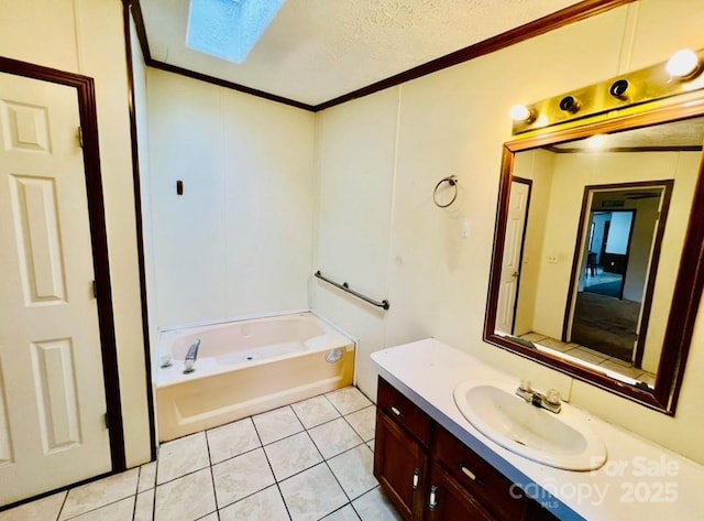 bathroom with a skylight, a bathing tub, tile patterned floors, crown molding, and a textured ceiling