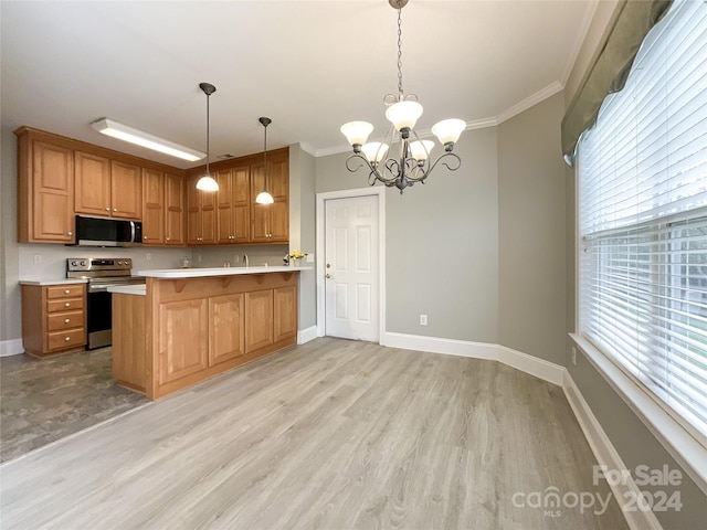 kitchen featuring kitchen peninsula, appliances with stainless steel finishes, decorative light fixtures, and light wood-type flooring