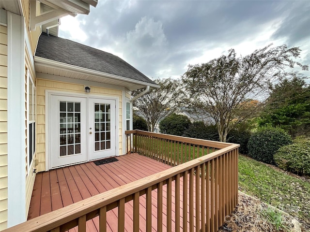 wooden deck featuring french doors