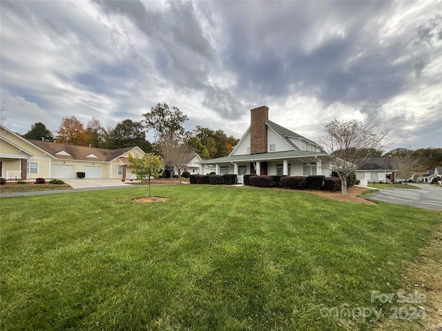 view of yard featuring a garage