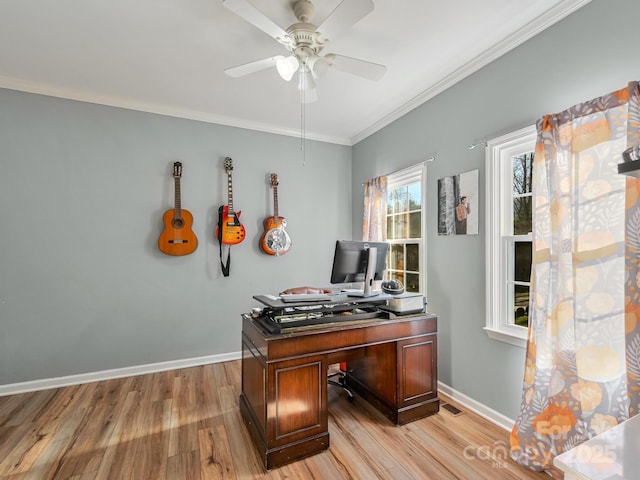 office space with light hardwood / wood-style floors, ceiling fan, and ornamental molding