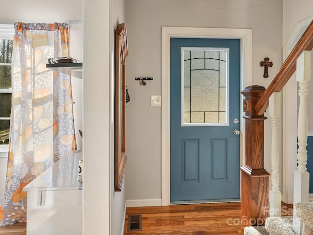 doorway to outside with hardwood / wood-style floors