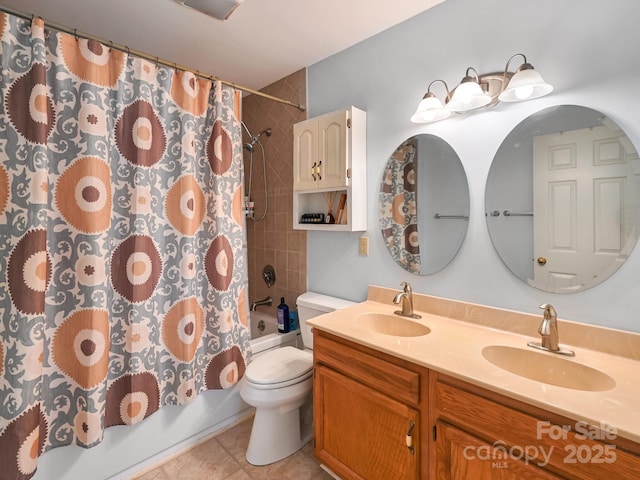 full bathroom with tile patterned floors, vanity, toilet, and shower / tub combo with curtain