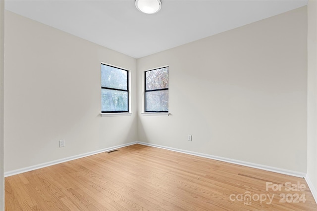 empty room featuring light hardwood / wood-style floors