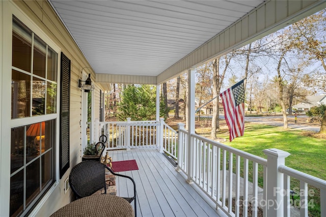 deck with covered porch