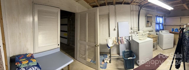 laundry room featuring washer and clothes dryer