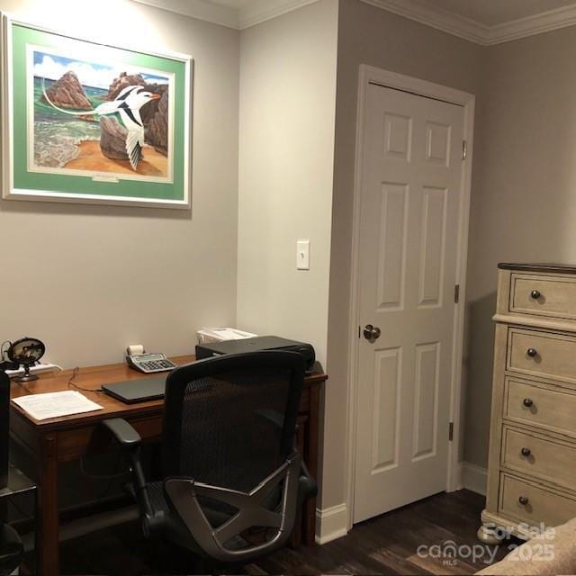 home office featuring dark hardwood / wood-style flooring and ornamental molding