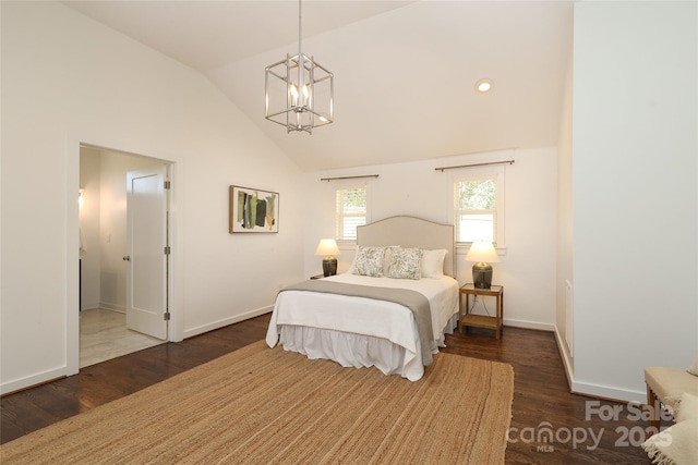 bedroom with lofted ceiling, dark wood-style floors, and baseboards