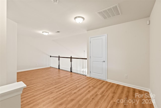 empty room featuring hardwood / wood-style flooring