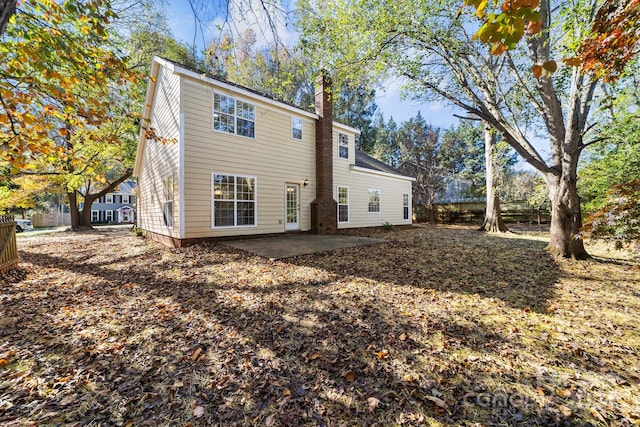 back of property featuring a patio