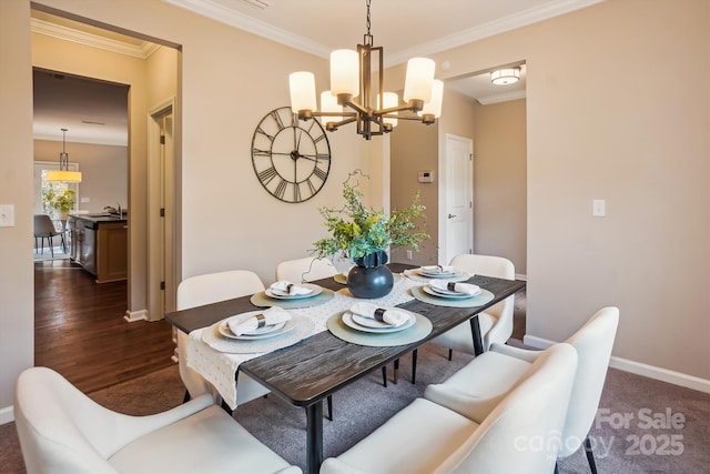 dining room featuring dark wood-style floors, baseboards, an inviting chandelier, and crown molding