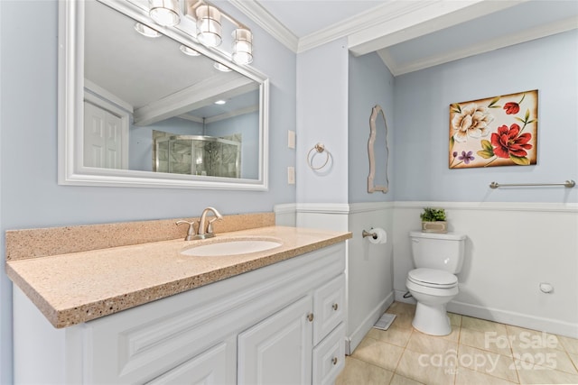 bathroom with toilet, vanity, tile patterned flooring, ornamental molding, and a shower with door