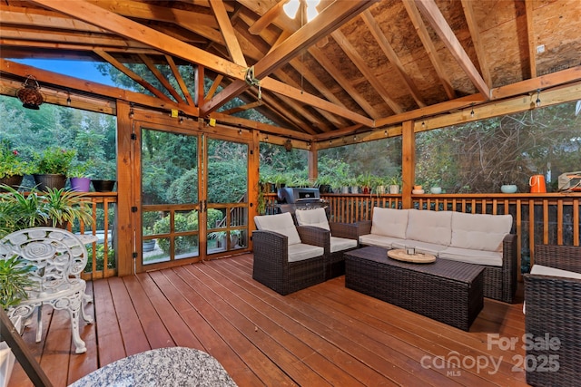 deck with an outdoor hangout area