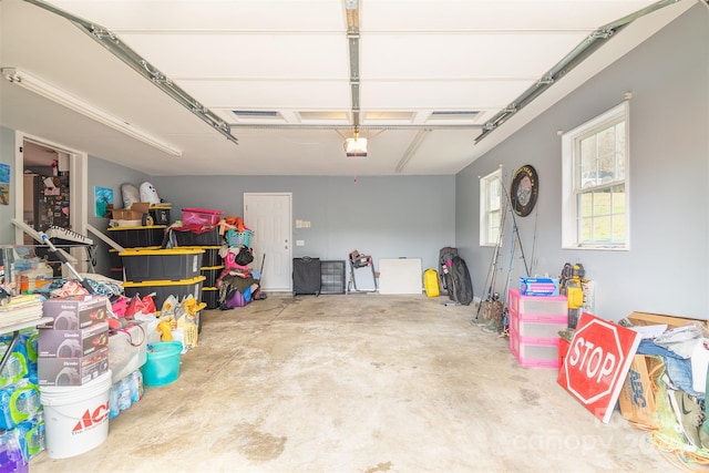 garage featuring a garage door opener