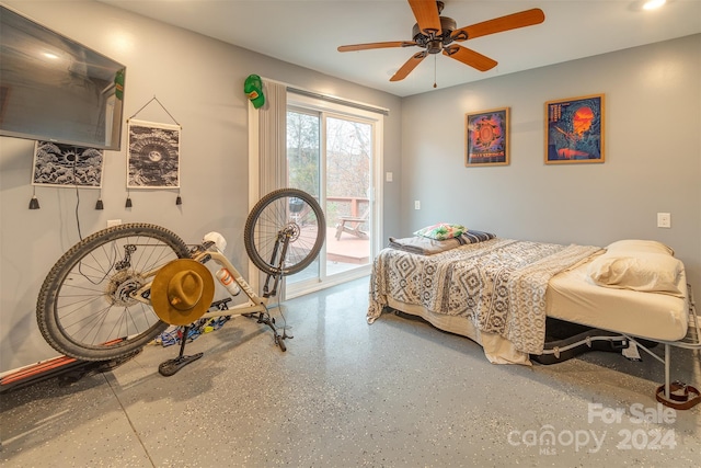 bedroom featuring ceiling fan and access to exterior