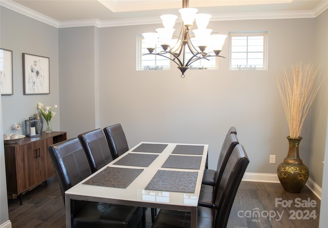 dining space featuring dark wood-type flooring, a chandelier, and crown molding