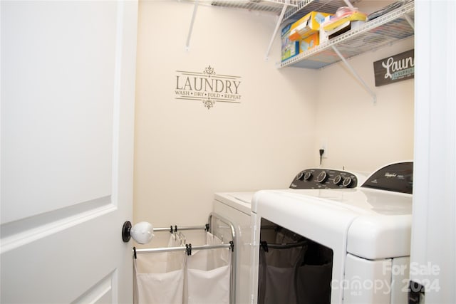 laundry area featuring independent washer and dryer