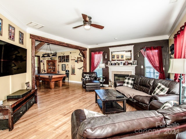 living room with hardwood / wood-style floors, ceiling fan, crown molding, and billiards