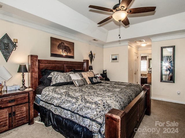 carpeted bedroom with ceiling fan and ornamental molding