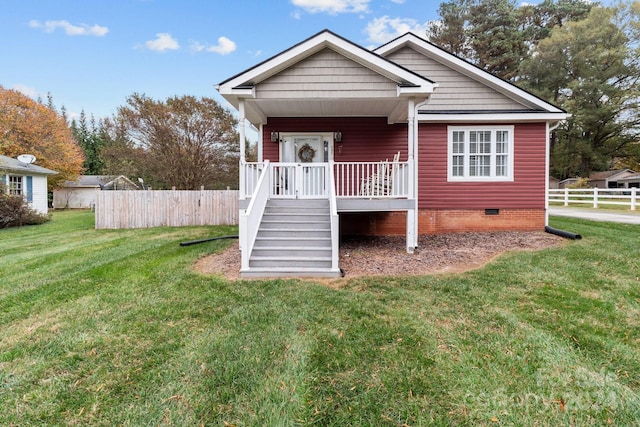 view of front of home featuring a front lawn