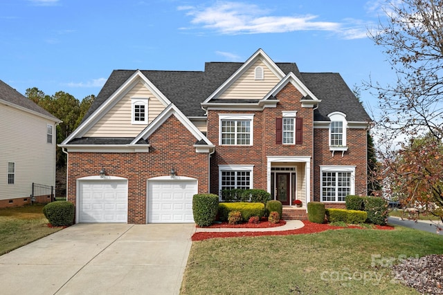 view of front facade featuring a garage and a front lawn