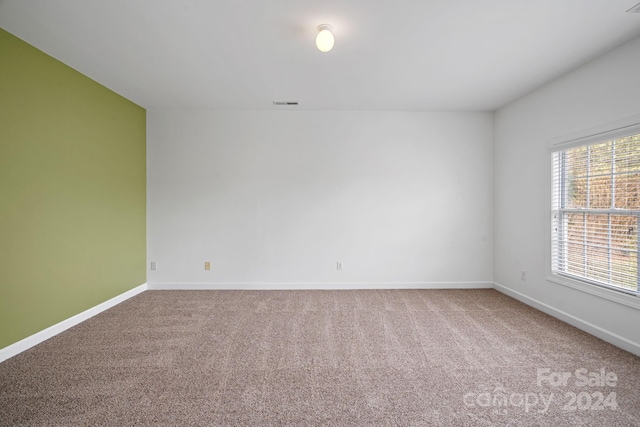 view of carpeted spare room