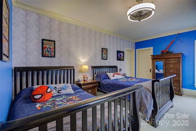 bedroom featuring ornamental molding and carpet flooring