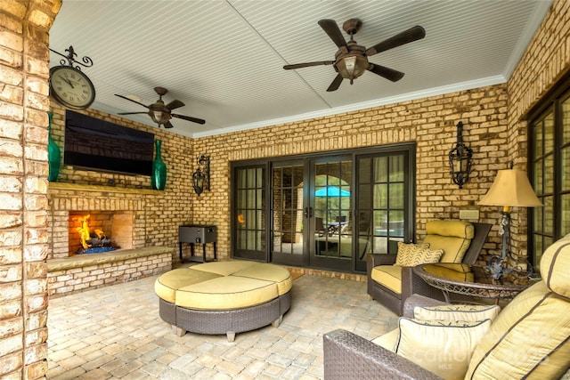 view of patio featuring an outdoor brick fireplace