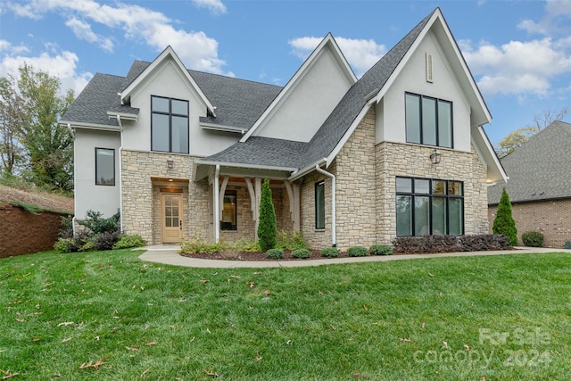 view of front of home featuring a front lawn