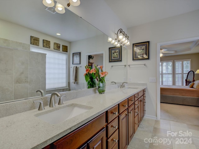 bathroom featuring vanity, ceiling fan, and tile patterned floors