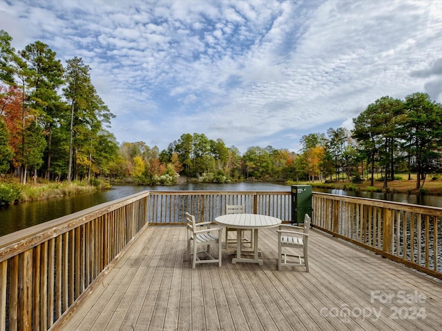 deck featuring a water view