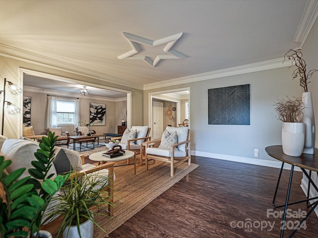 living room with dark hardwood / wood-style flooring and ornamental molding