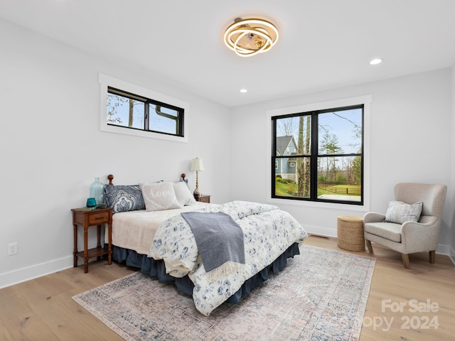 bedroom featuring hardwood / wood-style flooring