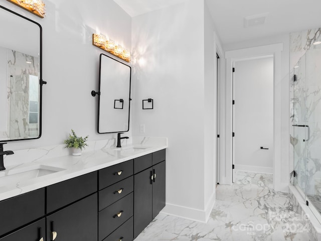 bathroom with vanity and an enclosed shower