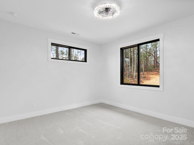 view of carpeted spare room