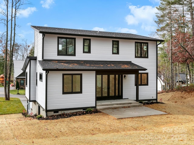 rear view of house featuring a patio area