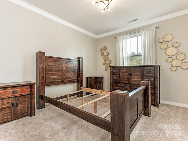 bedroom with light carpet and ornamental molding