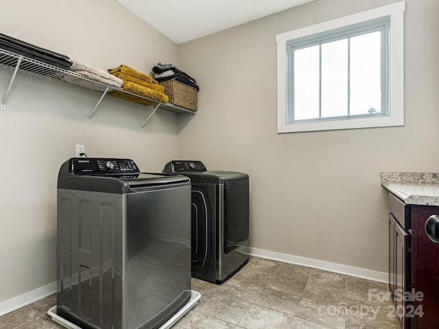 washroom featuring separate washer and dryer