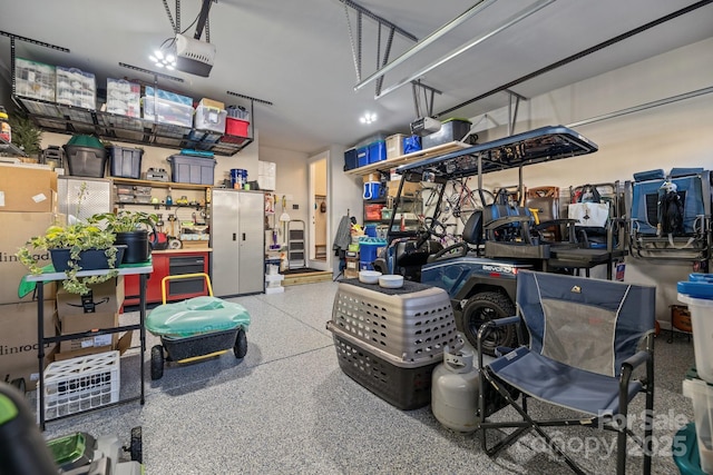 garage featuring a garage door opener