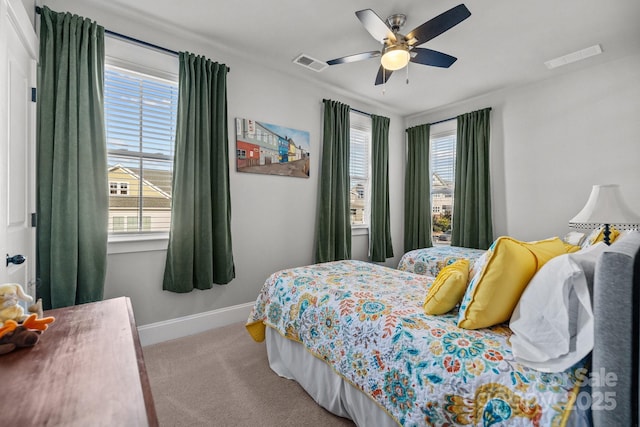 carpeted bedroom featuring ceiling fan