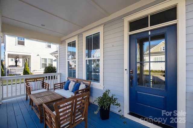 wooden deck featuring a porch