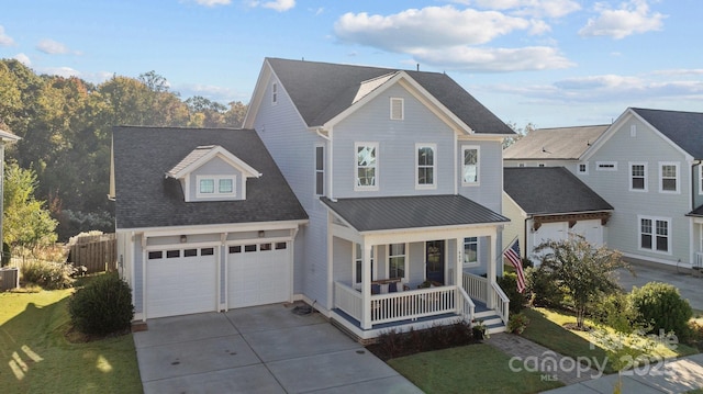 front of property featuring a garage, central AC, a front lawn, and a porch