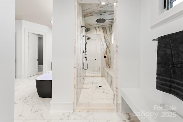 bathroom featuring shower with separate bathtub