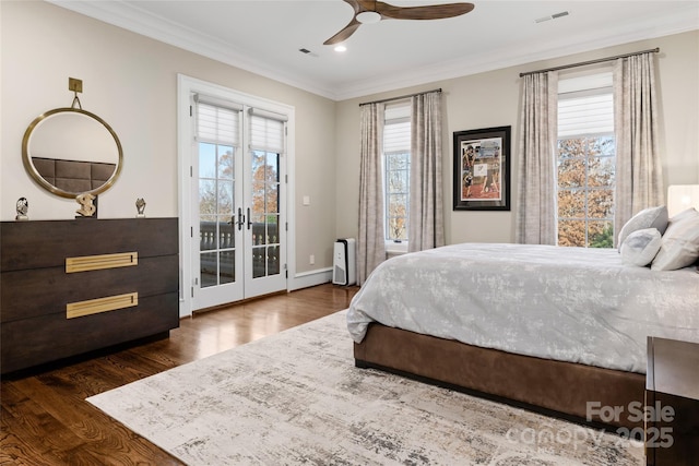 bedroom with crown molding, ceiling fan, access to exterior, dark hardwood / wood-style flooring, and french doors