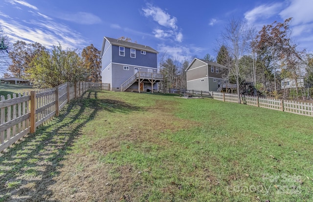 view of yard with a deck