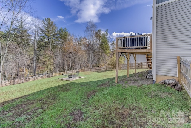 view of yard with a deck