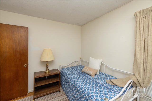 bedroom with a textured ceiling