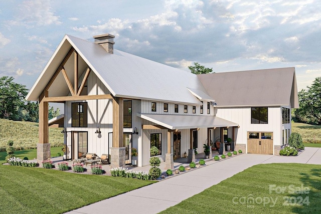 view of front facade featuring a patio and a front lawn