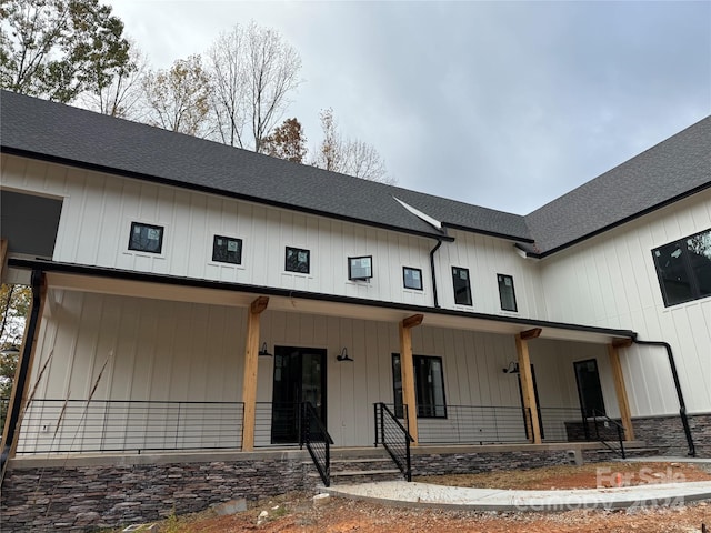 modern farmhouse featuring a porch